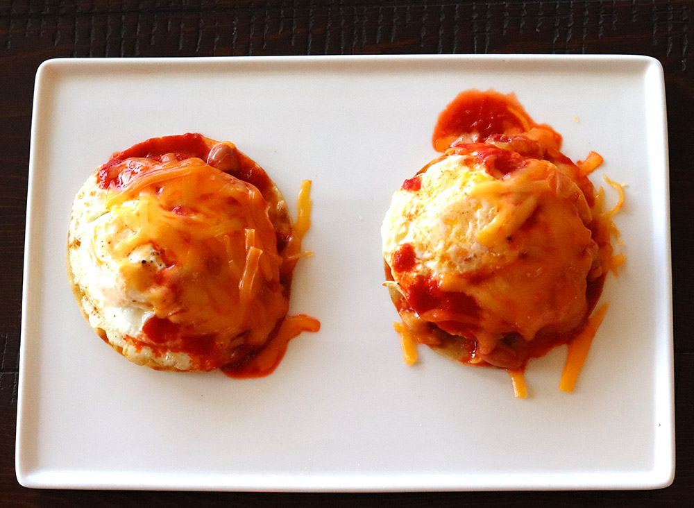 New Mexican Huevos Rancheros smothered with red chile and cheese