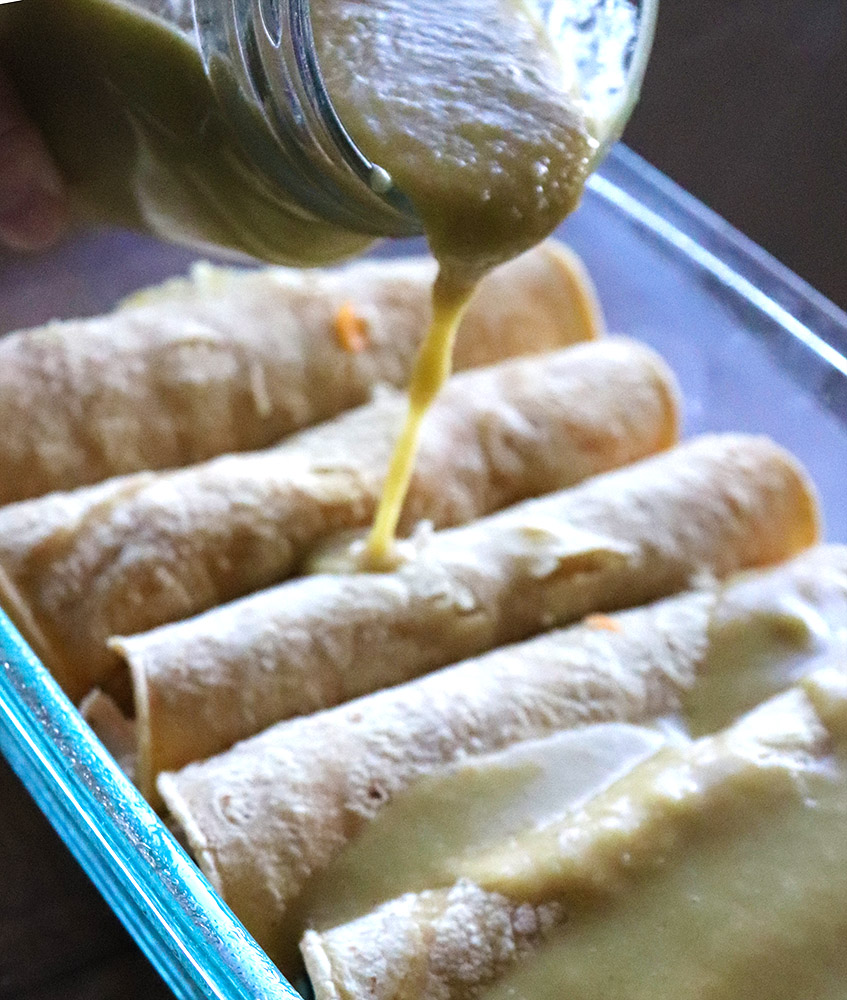 green chile smothered chicken and cheese enchiladas