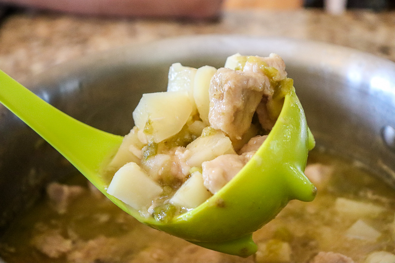 A ladle of Green Chile Stew